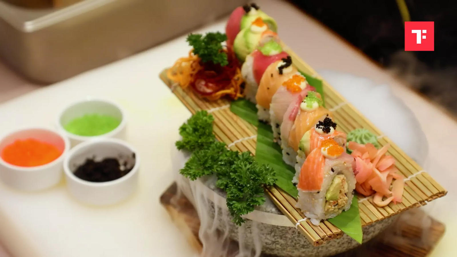 Premium Photo | Japanese sushi in serving lined in the form of a watch dial  with clock hands. top view, close up on dark background.