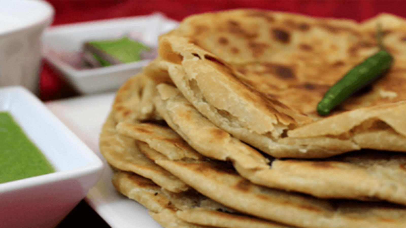 Aalu Paratha A Flat Unleavened Bread Resembling A Small Nan Bread That Is  Fried On A Griddle Served With Egg Curry Stock Photo - Download Image Now -  iStock