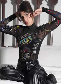 Rhea Chakraborty nails the all-black trend in sheer top and leather pants, see pictures