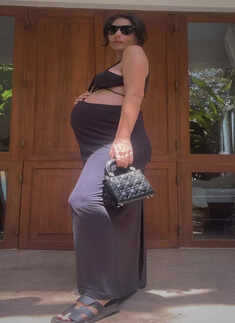 Gabriella Demetriades flaunts pregnancy glow in stunning cutout maxi dress