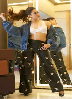 Tamannaah Bhatia looks sassy in white bralette and chic heart-patterned jeans