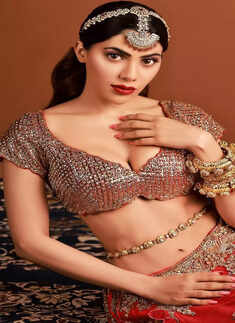 Nikki Tamboli sets the internet ablaze in red lehenga and shimmery blouse