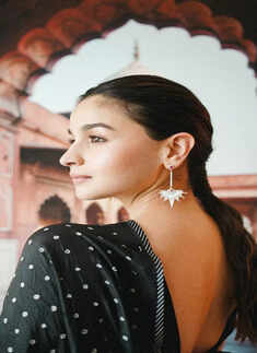 Alia Bhatt embraced 80's charm for her Delhi visit in a black dotted saree
