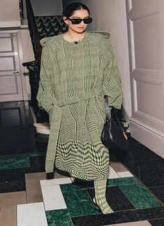 Sonam Kapoor ups the style quotient in a checkered trench coat at Wimbledon