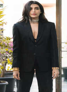​Karishma Tanna exudes boss lady vibes in a black power suit with bracelets​