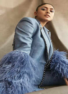 Mrunal Thakur ups the style quotient in pantsuit with dramatic fur sleeves