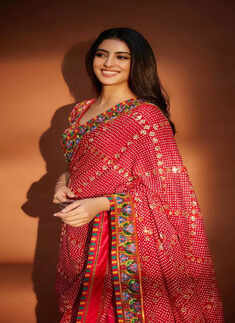 Navya Naveli's red bandhani saree is a stunning fusion of tradition and modern elegance