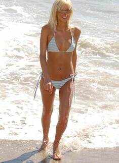 Paris Hilton strips in front of camera