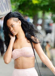 Rihanna goes braless, flashes nipples!