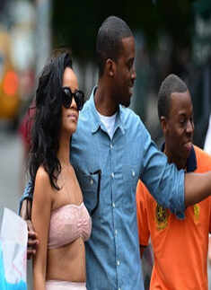Rihanna goes braless, flashes nipples!