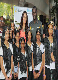 Bipasha Basu with school kids