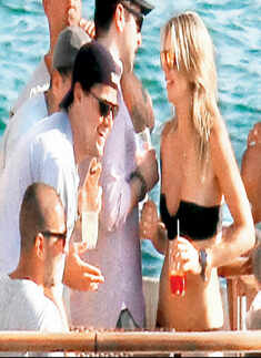 Leo parties with topless beauties
