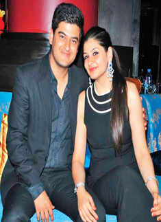 Golfers putt on party hats