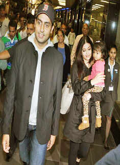 Bachchans back from NY