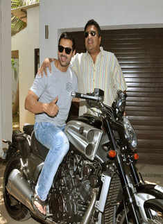 John gifts bike to Sanjay