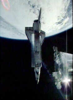 Space shuttle undocks