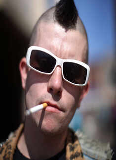 New York raises minimum age to buy cigarettes to 21