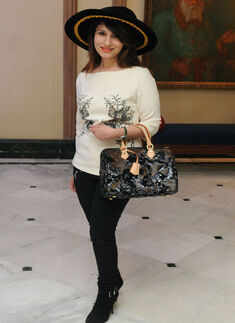 Rocking  the hat and boot look