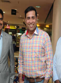 Actors and cricketers at a book store