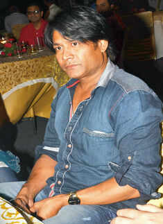Rakesh Pandey during a party Photogallery - Times of India