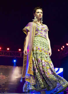 A model walks the ramp Photogallery - Times of India
