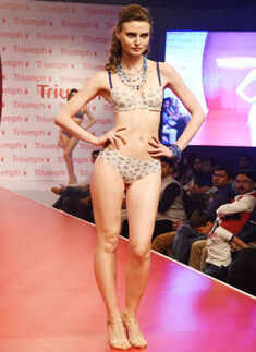 A model showcases a creation during Photogallery - Times of India