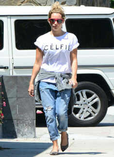 Ashley Tisdale was spotted wearing a t-shirt that read, "C&Eacute;LFIE"  Photogallery - Times of India