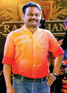 Niket Mishra poses during a fashion show Photogallery - Times of India