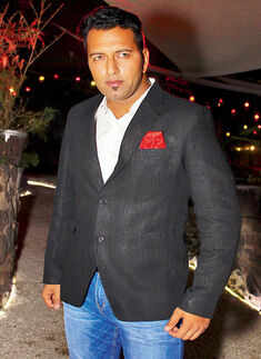 Gautam Vaid poses during a party Photogallery - Times of India