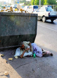A homeless person finds shadow near Photogallery - Times of India