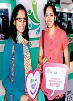 Customers pose after donating Photogallery - Times of India
