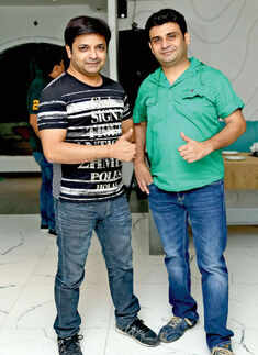 Nitin (L) and Rakesh during a party Photogallery - Times of India