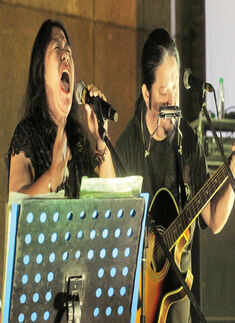 Sonam (R) and Dina Sherpa during a fundraiser concert Photogallery - Times of India