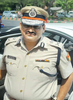 Mukesh Meena, joint commissioner of  police, New Delhi range during a summer camp Photogallery - Times of India