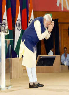 Prime Minister Narendra Modi greets the students Photogallery - Times of India