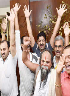 Pilgrims embrace during the flag off ceremony