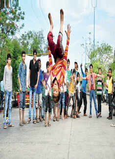 A youngster showing a back flip