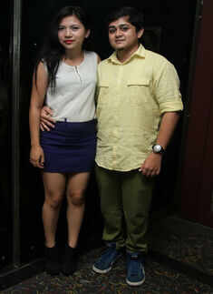 Annie and Vinay during a party