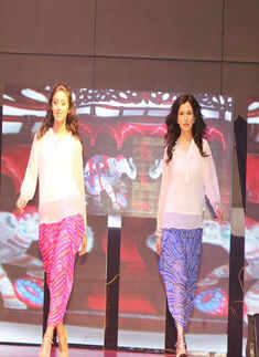 Models walk the ramp during Pune Fashion Weekend