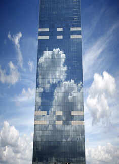 Clouds are reflected in the Midi Tower
