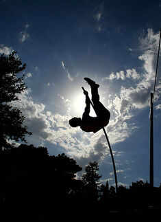 A competitor makes a jump in the Pole Vault