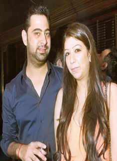 Akshay Anand and Devina pose together