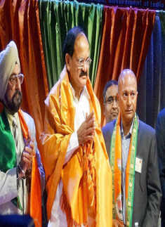 Union Urban Development Minister Venkaiah Naidu being felicitated