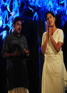 Artists perform during the play