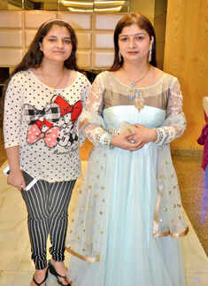Vaishali and Sapna pose during a party