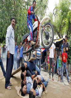 A Hindu devotee performs a stunt