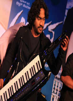 Arjun Janya performs during the audio launch