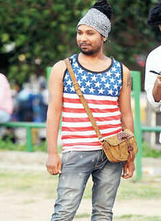 A demonstrator poses