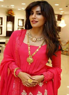 Chitrangada Singh gets clicked during the inauguration