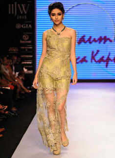 A model showcases a creation